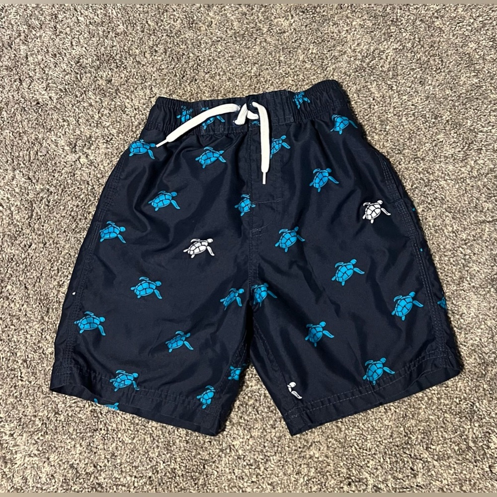 Kanu Surf boys swim trunks, size 4 (small)